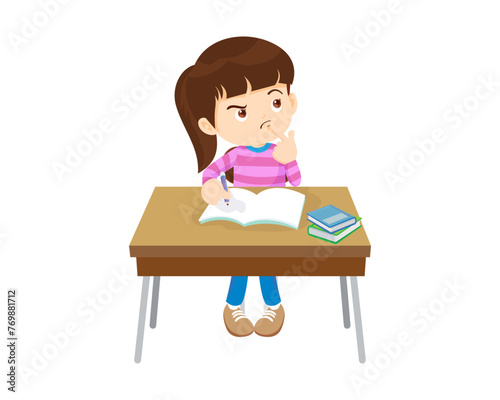 cute student sitting on desk working for homework