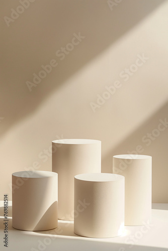 Four white podiums for the presentation of the product. White background. Minimal. beige. 3D rendering. Pedestals. © keisuke
