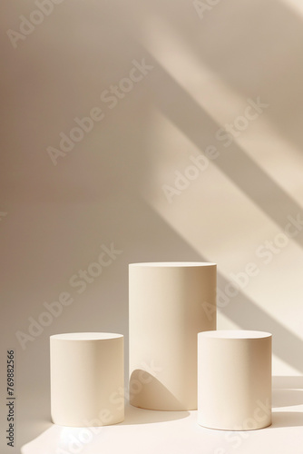 Three white podiums for the presentation of the product. White background. Minimal. beige. 3D rendering. Pedestals. © keisuke