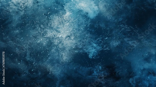 Abstract dark blue and white spray paint texture background, grungy retro vibe with grainy noise and glow effect