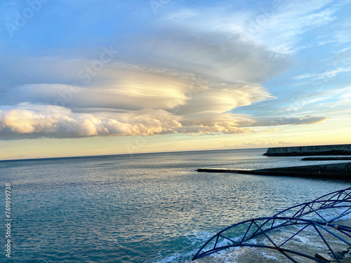 beautiful clouds over the sea in calm weather1 photo