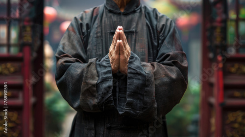 Buddhist Monk Praying in a Temple