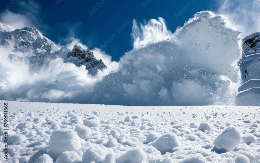 A snow avalanche unfurls like a veil over the alpine slopes, framed by a brilliant blue sky.
