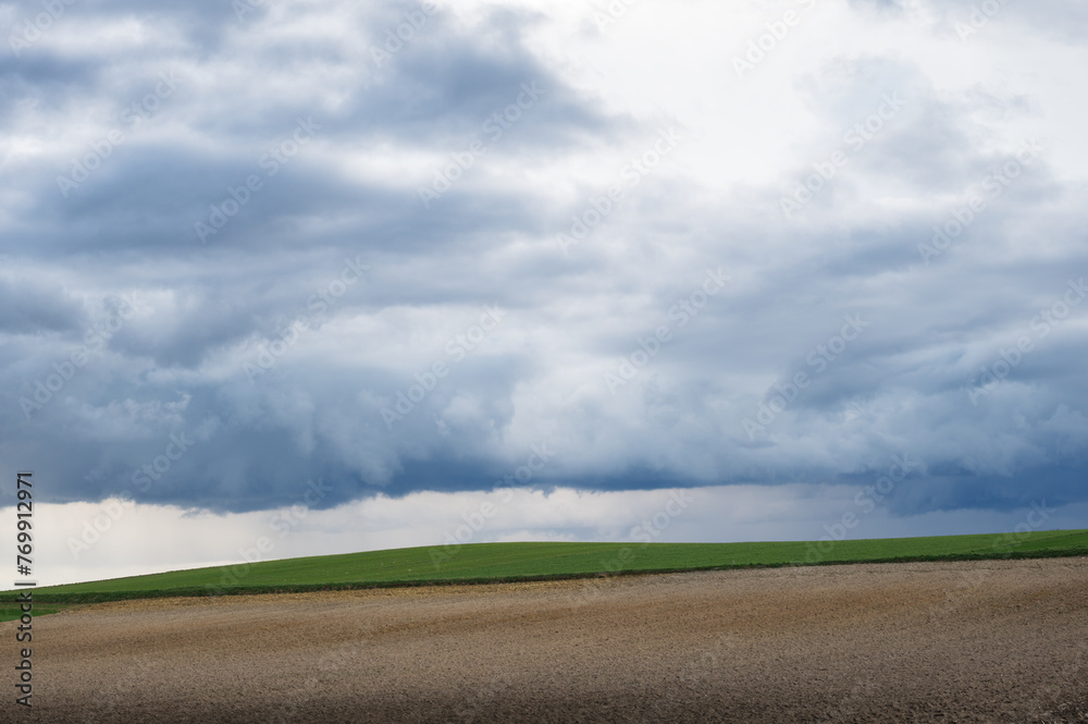 storm clouds over a field