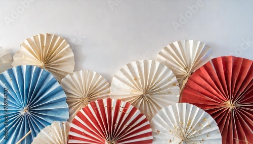 patriotic background with paper fans on a white background red blue and white colors