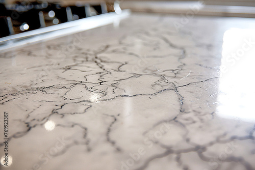 A pristine marble counter top captured in high definition  showcasing its smooth surface and subtle variations in colour.  