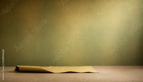 photo background green textured wall rolling in the floor studio photography background illuminated by the directed light traditional painted canvas or muslin fabric cloth studio backdrop photo
