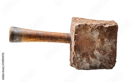 A large rock with a wooden handle rests on a white background