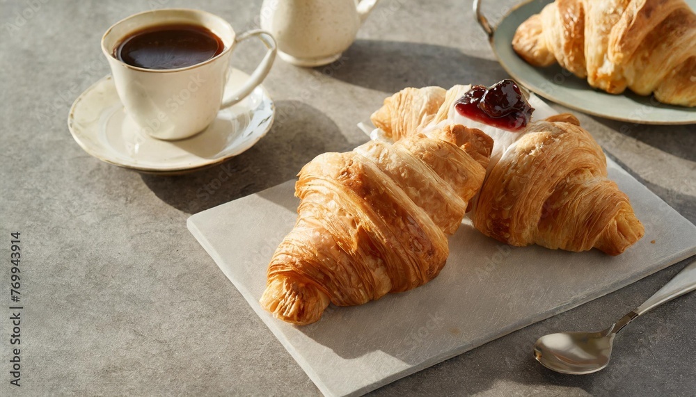 french croissant freshly baked croissants with jam on dark stone background with coffe tasty croissants with copy space