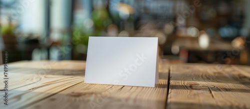 Template for a table tent card mockup with space for your logo or graphic design. photo