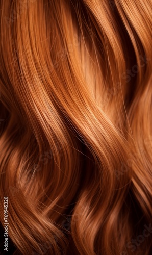Extreme close-up shot of hair texture, with slight curves brown with copper highlights 