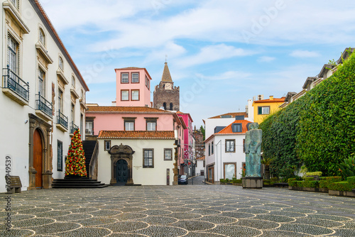 The Capela de Santo António da Mouraria, or Chapel of Saint Anthony with the gothic tower of the Funchal Cathedral behind, old town Funchal, Madeira, Canary Islands photo