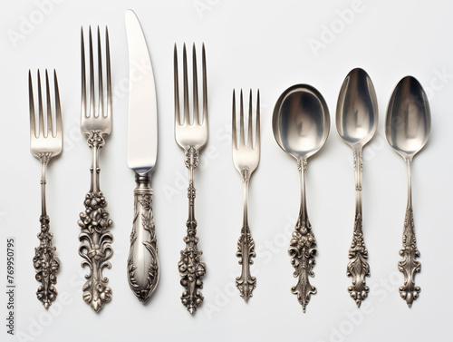 photorealistic traditional silverware with highly ornate unique designs on white background with realistic reflections and lighting
