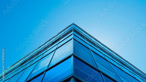 Modern Glass Building Against Blue Sky