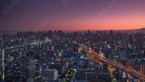 Wallpaper Mural osaka city downtown skyline aerial view timelapse night to day pan,high pov view time lapse of town cityscape,big highway getting into the city center at sunrise Torontodigital.ca