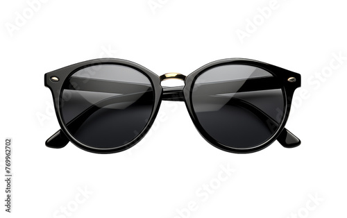 A sleek, black-framed pair of sunglasses sits elegantly on a surface