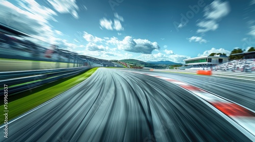 Speed spectacle! Blurred racetrack with starting or ending line captures the intensity of high-speed competition, thrilling spectators.