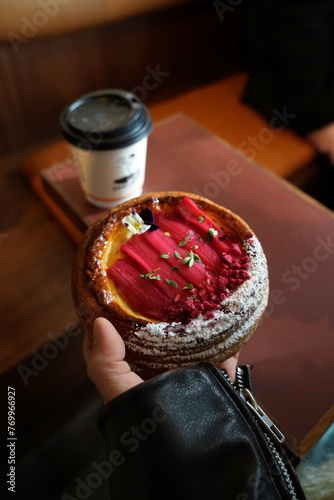 person holding a dessert 