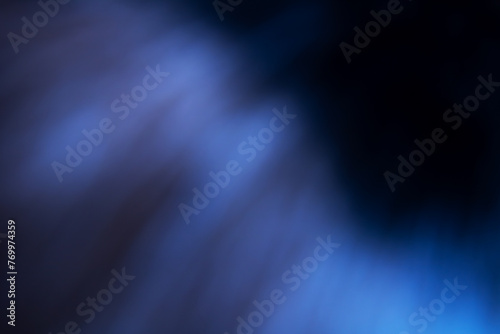 Abstract blurred photo of blue with black