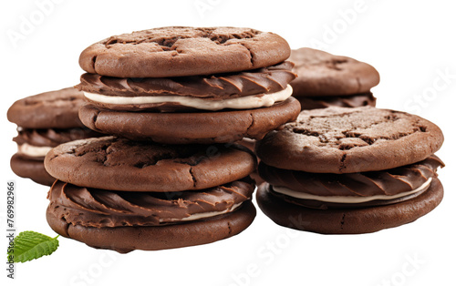 A decadent pile of chocolate cookies with luscious cream filling, inviting indulgence photo