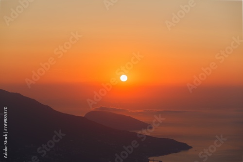 Beautiful mountain landscape with sunset sky with sea