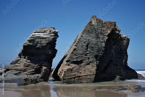 Beach of the Cathedrals, Ribadeo - Lugo, Spain, two rocks in the entrance of the beach.
