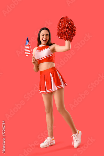 Female cheerleader with USA...