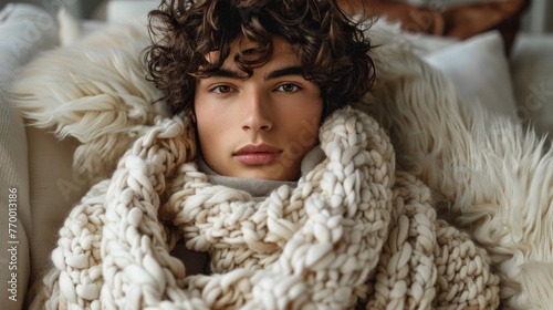 Young Man With Curly Hair Wearing a Scarf