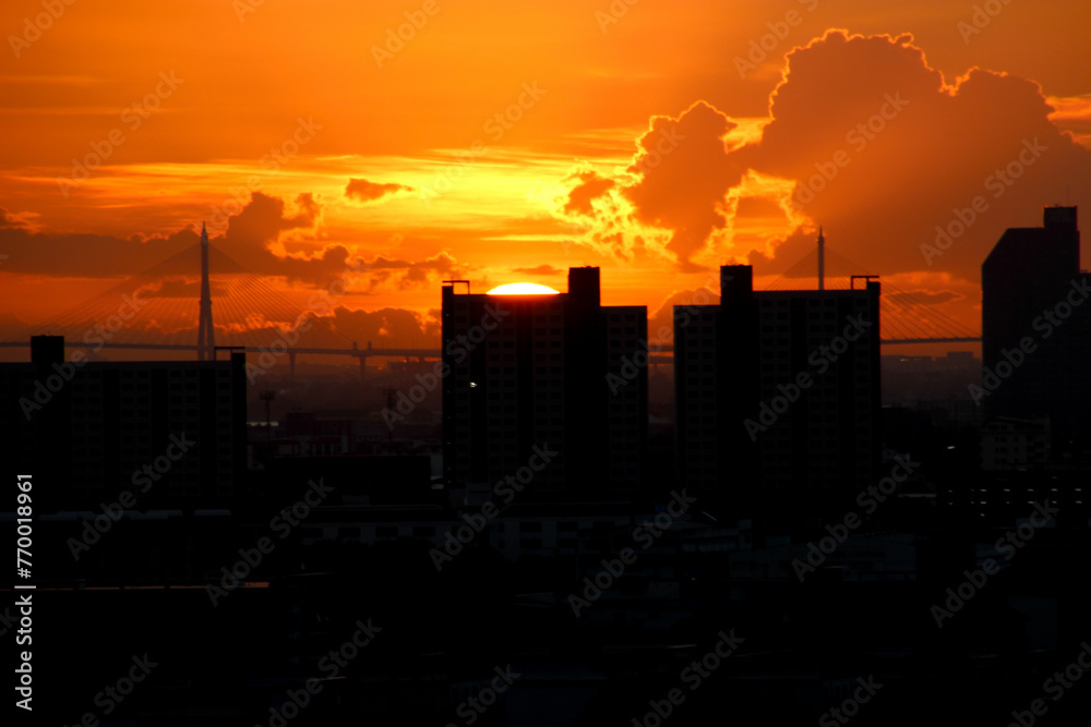 heaven cloudy sky day evening dusk time with sunlight ray from between clouds with city town background