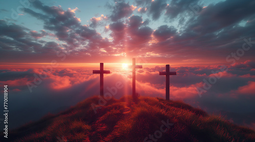 Three crosses on a hill at sunset and blue sky