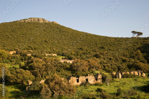 Industrial buildings and machine of abandoned Mine of Montevecchio in Sardinia, Arbus, Guspini, Italy, Piscinas Ingurtosu. Medio Campidano, Sardegna, Italy photo