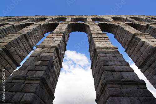 Segovia ancient roman aqueduct in Spain , Europe ; Unesco  World heritage site photo