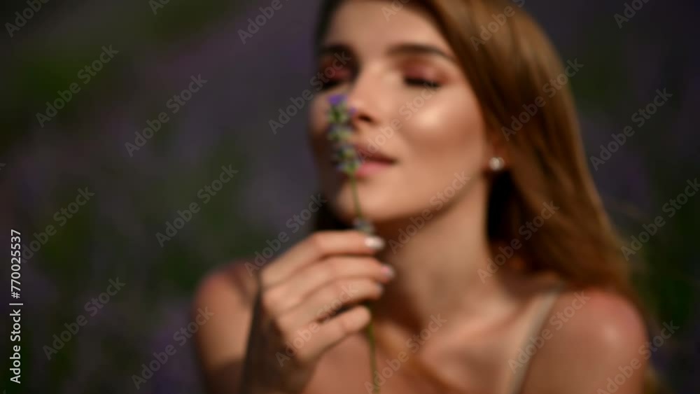 Women with flowers. Close up lady face with flower bouquet in sunlight. Face of a happy girl enjoying flower buds. Women with flowers. Close up lady face with flower bouquet in sunlight. Face of a happy girl enjoying flower buds.