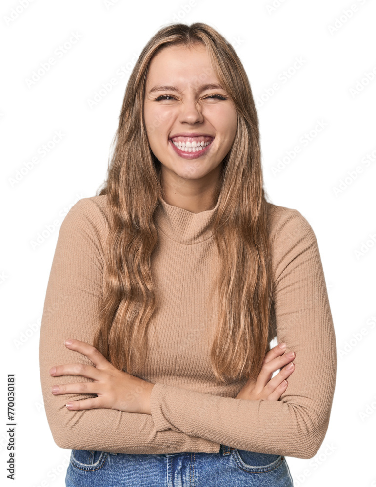 Studio portrait of a blonde Caucasian woman laughing and having fun. Studio portrait of a blonde Caucasian woman laughing and having fun.