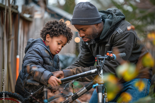 Man Helping Young Boy Fix Bicycle
