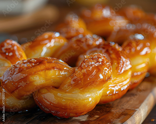 Close-up of South African koeksisters, braided doughnuts that are fried and soaked in a ginger-flavored syrup photo