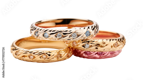 Three radiant gold rings in different hues adorned with dazzling diamonds