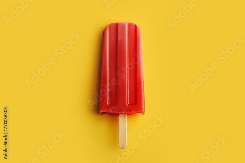 Vibrant Red Popsicle on Yellow Background. Generative AI image photo