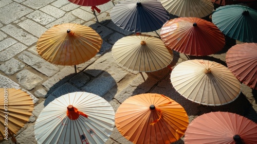 Colorful Umbrellas on Cobbled Street