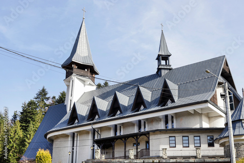 NOWY TARG, POLAND - MARCH 26, 2024: A modern church in the Kowaniec district of Nowy Targ.