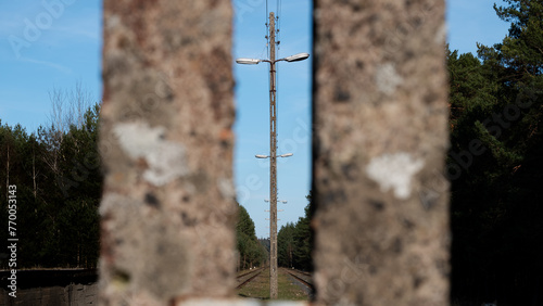 Fototapeta Naklejka Na Ścianę i Meble -  Betonowe Słupy energetyczne w linii