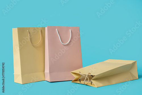 Three empty shopping bags i...