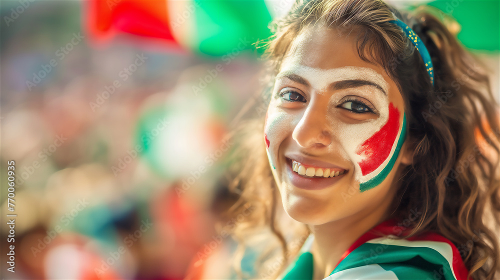 A cheerful fan of the national team with a cheering crowd in the background.