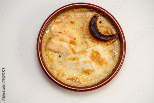 Fish baked with cheese, fish dish on the background, tasty and healthy fish 