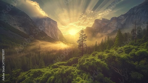  The sun shines through the clouds over a Yosemite Valley in the Yosemite Mountains © Olga