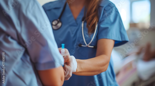 A nurse gives an injection to a patient in a hospital room