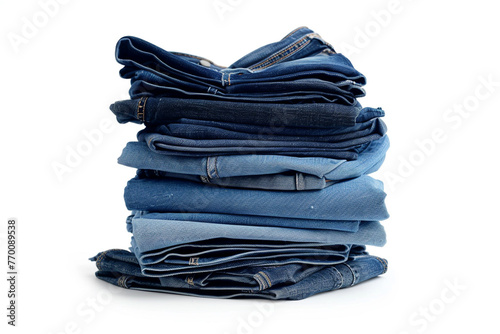 Stack of Various Shades Of Blue Jeans On White Background Denim jeans texture. Denim backgroundisolated on solid white background.