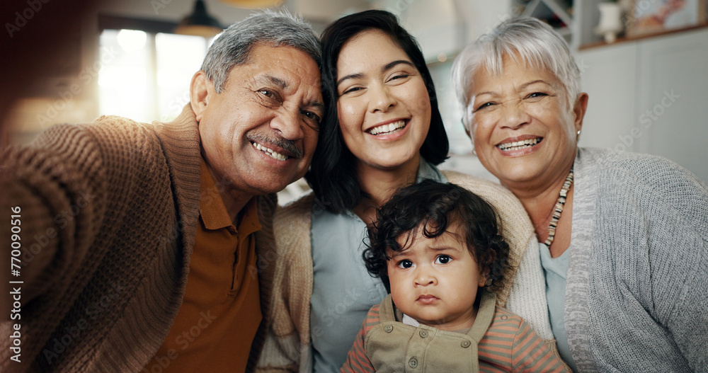 Happy family, love and selfie in a living room relax, bond and laughing in their home. Portrait, smile and baby with mother and grandparents in a lounge together for profile picture, moment or memory Happy family, love and selfie in a living room relax, bond and laughing in their home. Portrait, smile and baby with mother and grandparents in a lounge together for profile picture, moment or memory