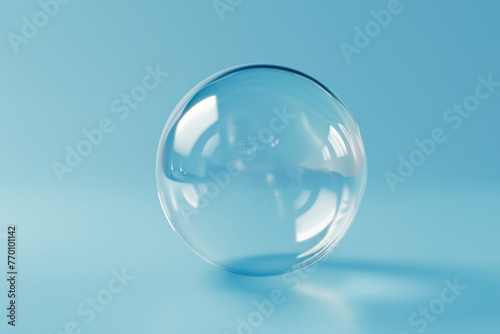 Clear Glass Ball on Blue Background