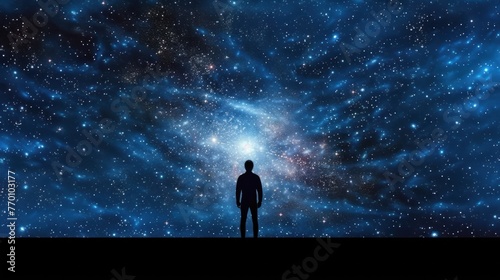 Silhouette of a man inside the universe photo